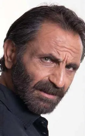 Фотография актёра Гюркан Уйгун